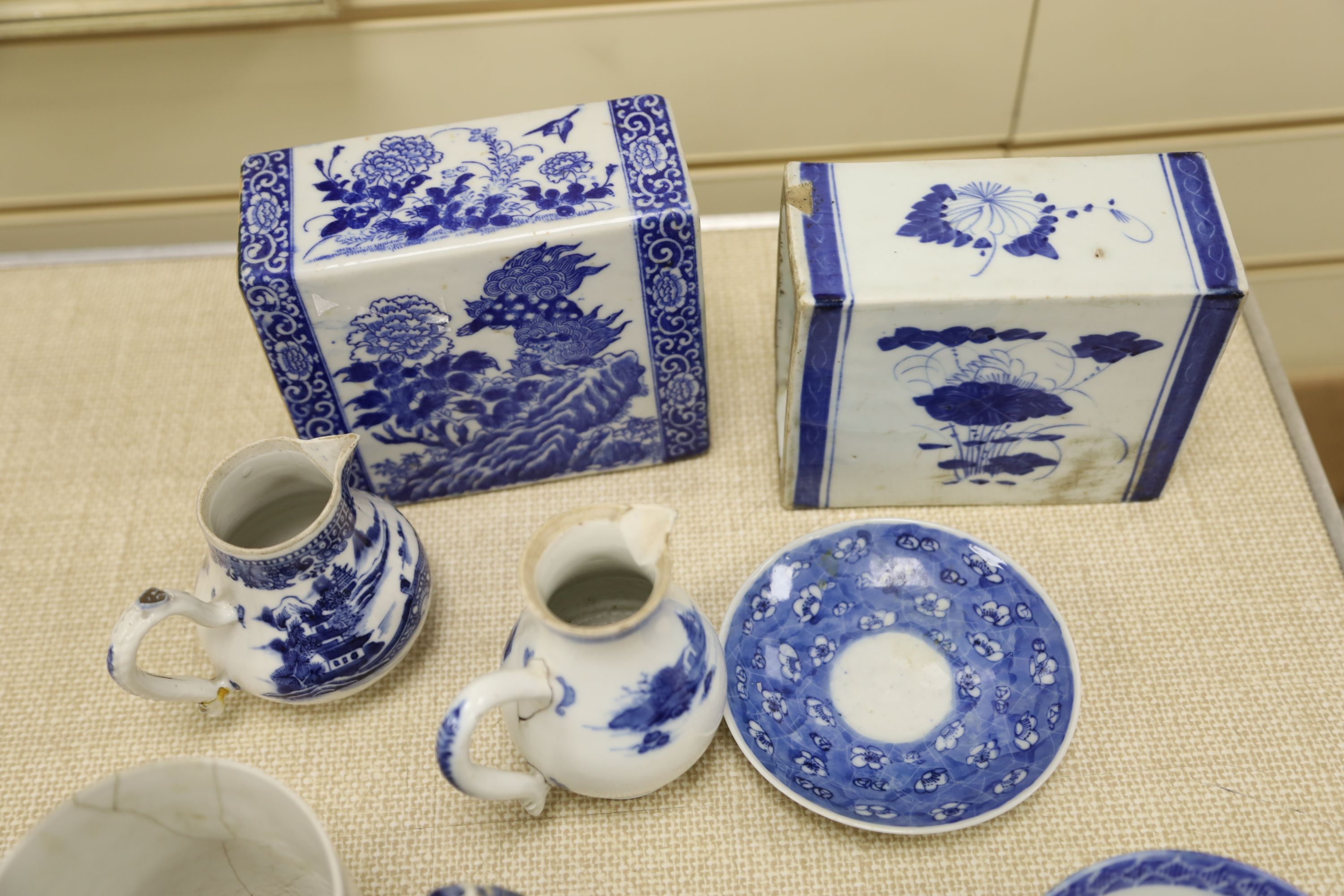 An 18th century Chinese export blue and white mug, 10.5cm, two porcelain pillows and sundry ceramics (a.f.)